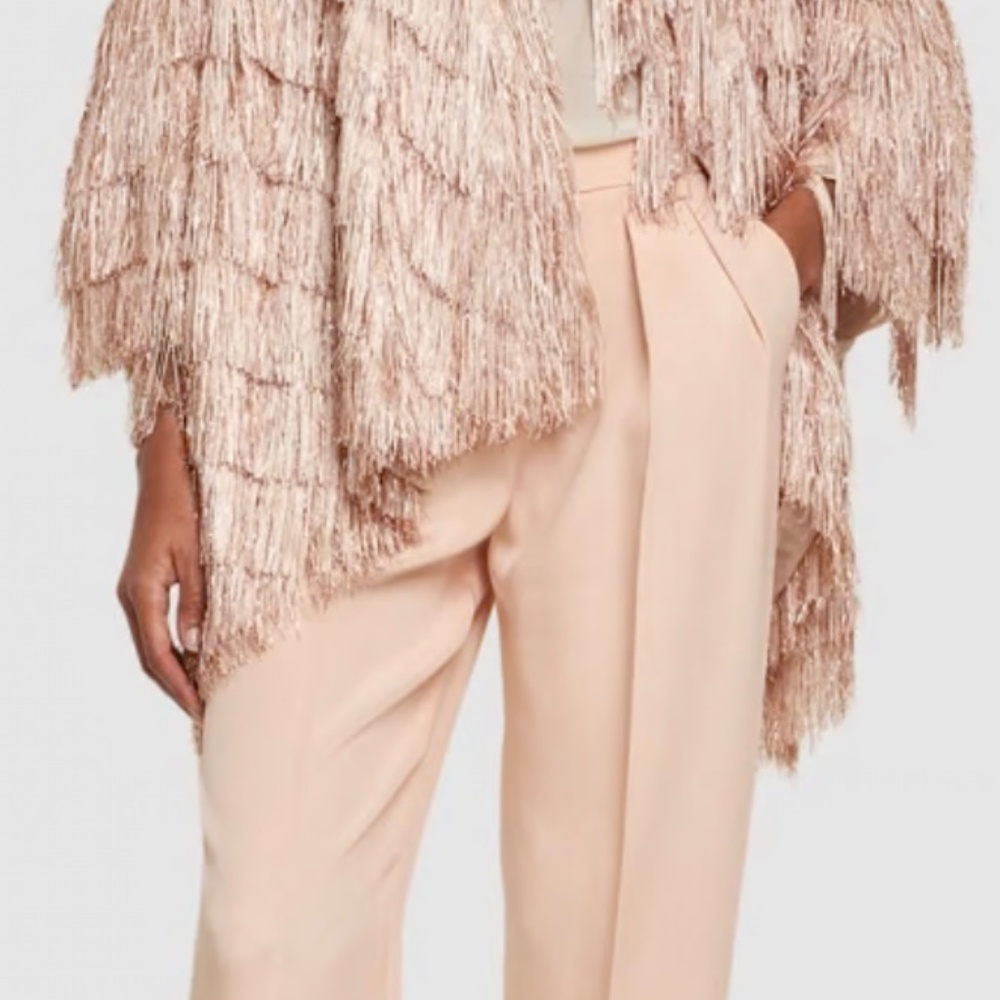 Giorgio Armani rose gold fringe jersey Poncho $2,595. Metallic fringe cape.